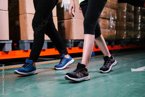 Photo of two teenage boys and girls walking together