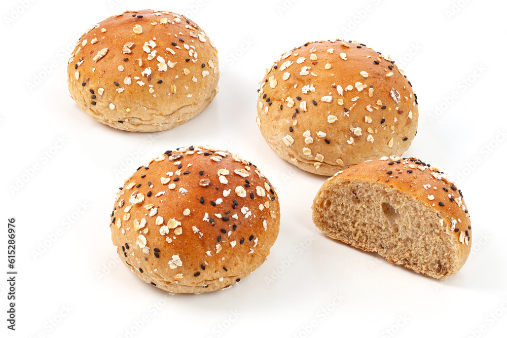 a couple of round wholemeal bread on white background