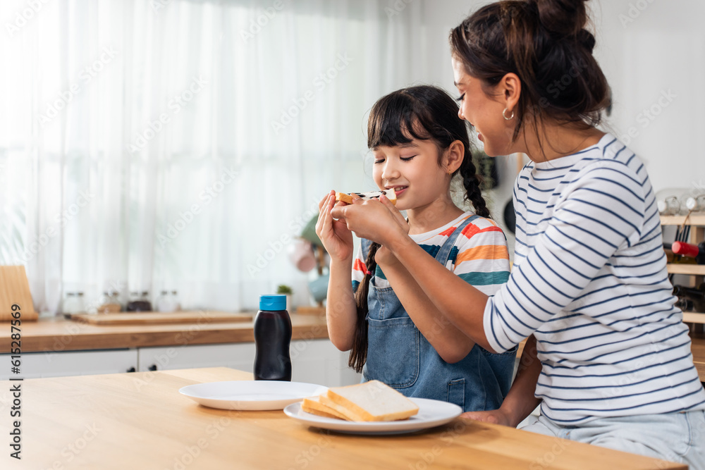Caucasian happy family, parent spend time with kid together at home. Caucasian happy family, parent spend time with kid together at home.