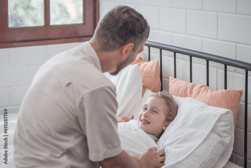 Father singing his daughter to sleep, providing comfort, support, and security. Focusing on fulfilling both physical and emotional needs. Kids sometimes act happy while pretending to fall asleep. Father singing his daughter to sleep, providing comfort, support, and security. Focusing on fulfilling both physical and emotional needs. Kids sometimes act happy while pretending to fall asleep.