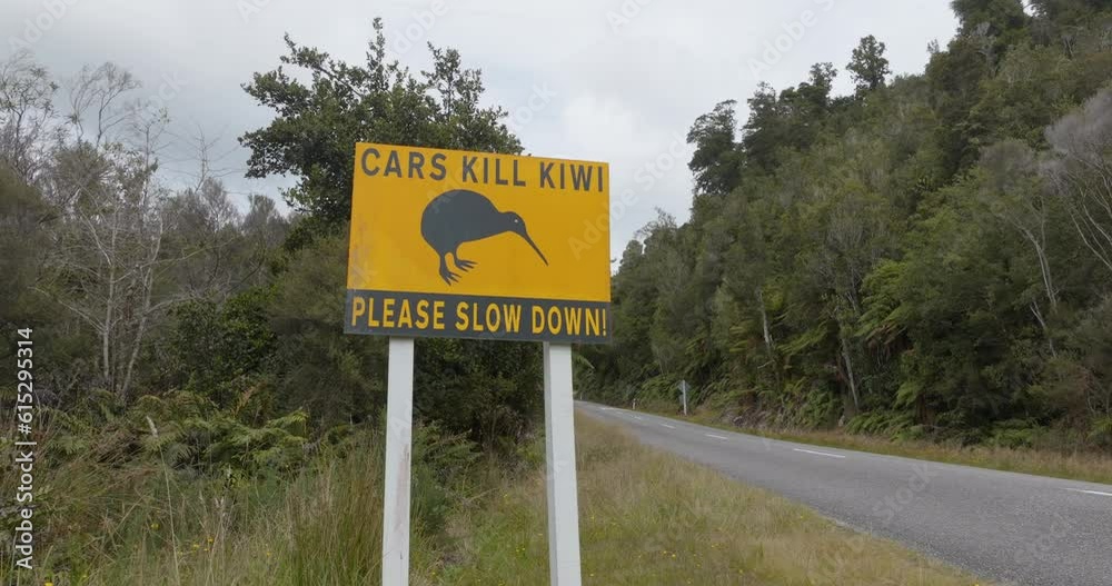 Aerial: Road sign warning for kiwi birds, South Island, New Zealand Aerial: Road sign warning for kiwi birds, South Island, New Zealand