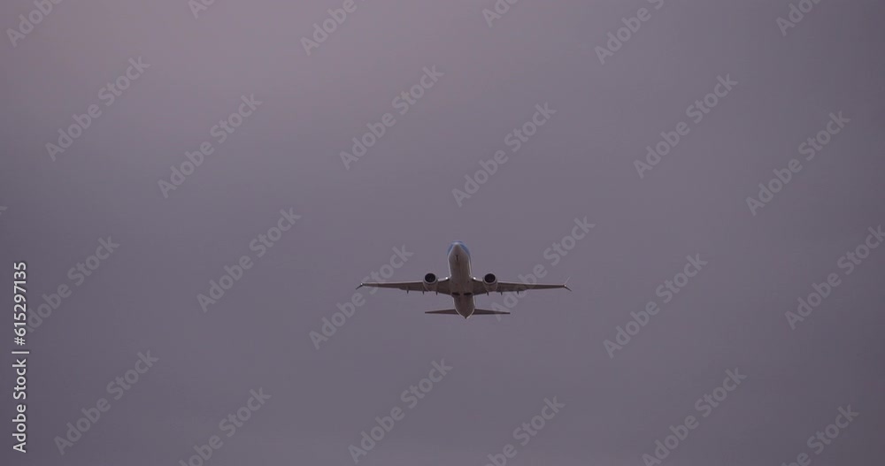 front view of airplane take off Commercial Airliner In Tenerife South Airport cloudy day front view of airplane take off Commercial Airliner In Tenerife South Airport cloudy day