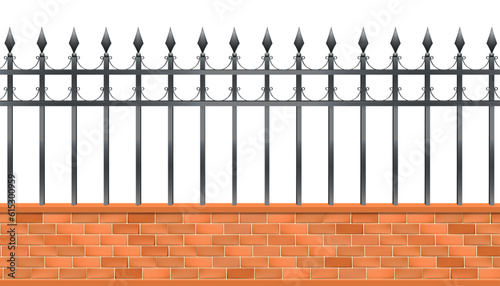 Brick wall with fence.Wall with design.Isolated brick wall with railings.Wrought iron fence