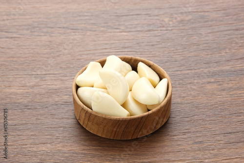 Fresh garlic (bawang putih) on a wooden table 