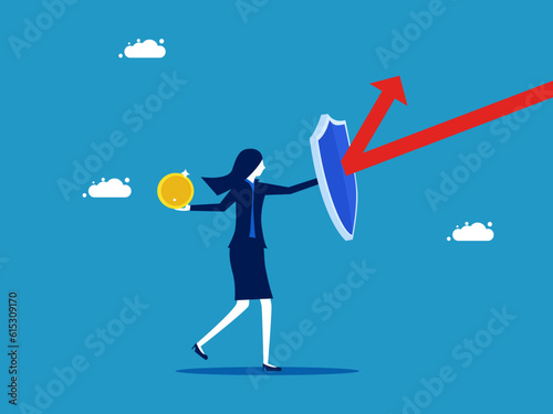 Protect finances. Businesswoman holding a shield to protect coin vector © Nastudio