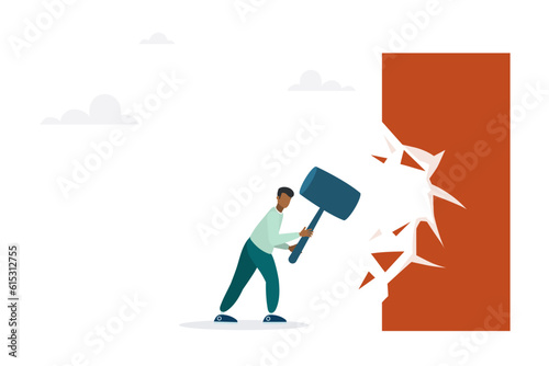 Overcome business boundaries or restrictions, break down walls to see new job opportunities. Concept of career challenges. The guy breaks the wall with a hammer.

