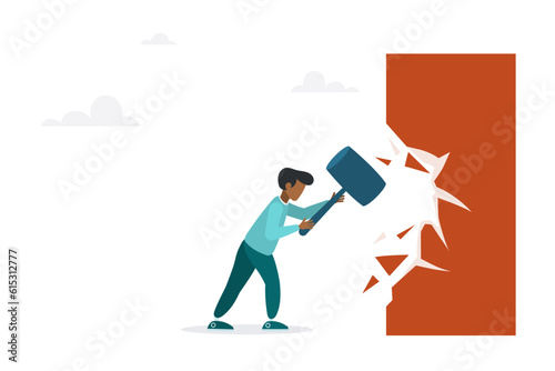 Overcome business boundaries or restrictions, break down walls to see new job opportunities. Concept of career challenges. The guy breaks the wall with a hammer.
