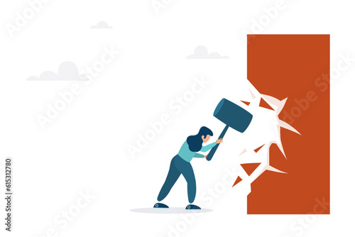 Overcome business boundaries or restrictions, break down walls to see new job opportunities. Concept of career challenges. The girl breaks the wall with a hammer.