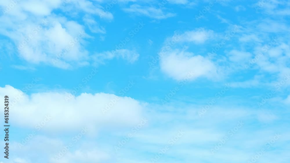 Blue sky time-lapse. The ever-changing formations, from fluffy cumulus to wispy cirrus, create a mesmerizing tapestry that captivates the viewer's imagination and evokes a sense of serenity and awe.
