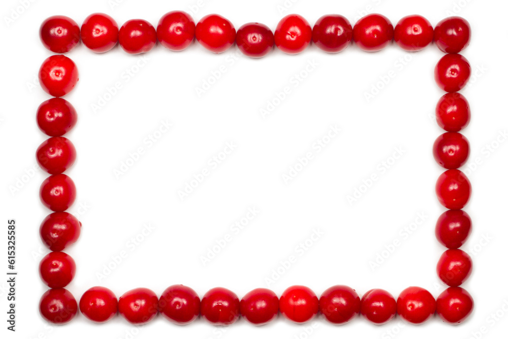 Cherry frame on a white background. The frame is made of red natural cherries. Cherry frame on a white background. The frame is made of red natural cherries.