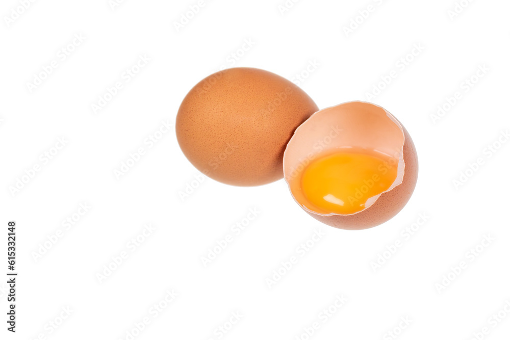 Yolk in an eggshell on a white background. Yolk in an eggshell on a white background.
