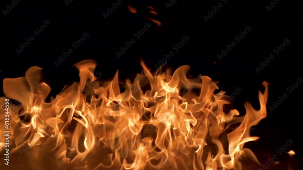 Flames move across a concert floor.