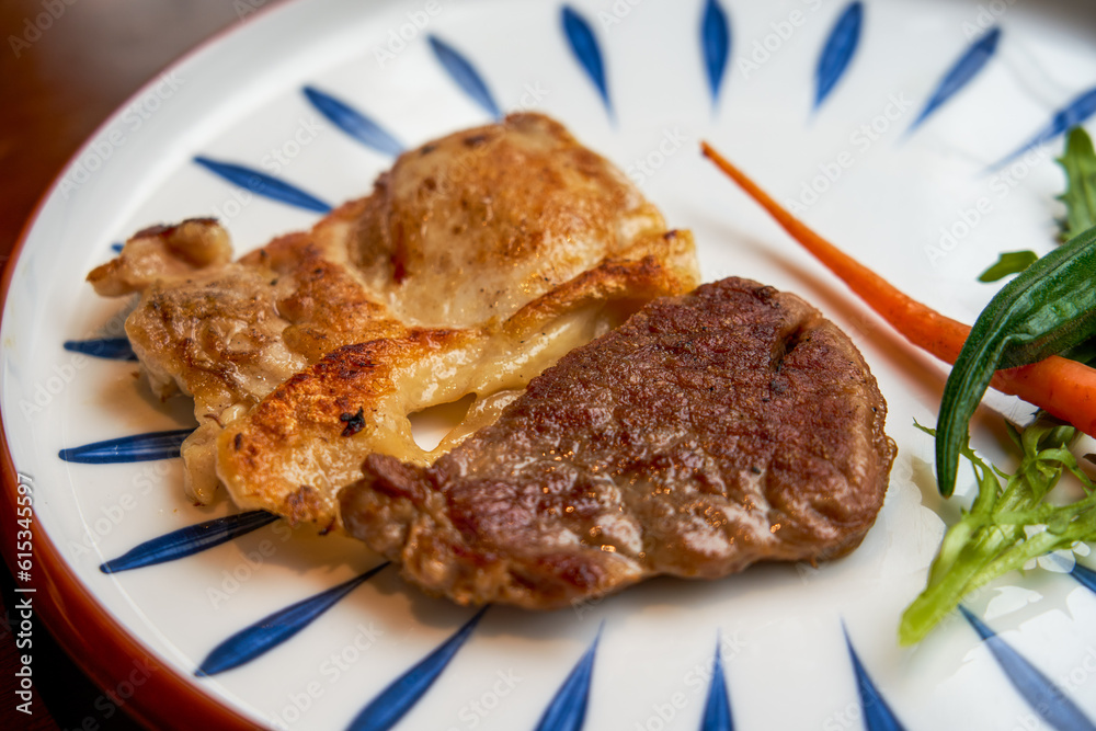 A delicious chicken and steak pairing in a western restaurant A delicious chicken and steak pairing in a western restaurant