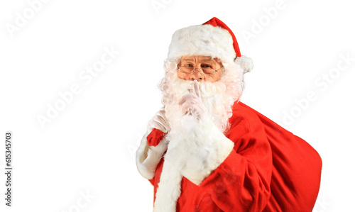 Santa Claus holding carrying sack with gifts for kids on a transparent background
