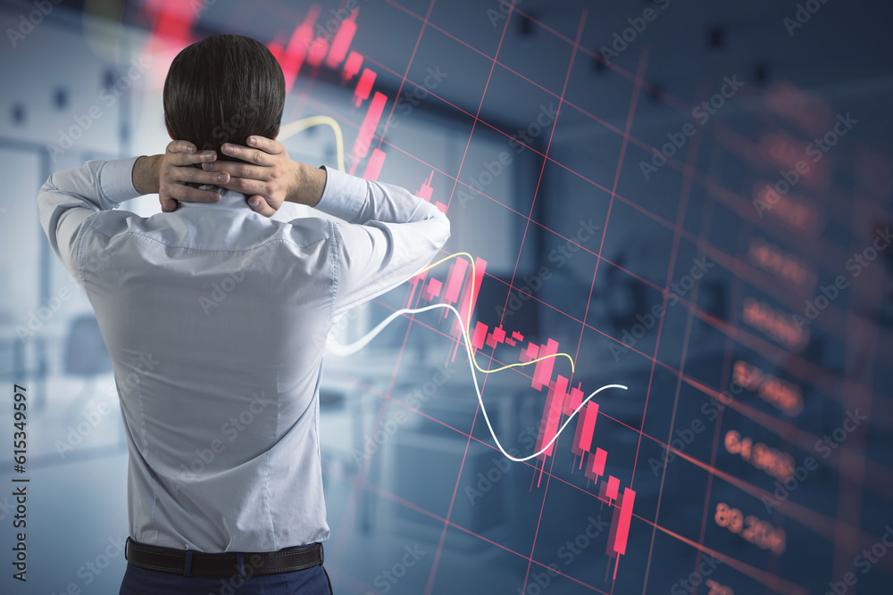 Inflation, stock market crash and crisis concept with pensive trader back view looking at digital falling down red financial chart candlestick and diagram on technological background, double exposure Inflation, stock market crash and crisis concept with pensive trader back view looking at digital falling down red financial chart candlestick and diagram on technological background, double exposure