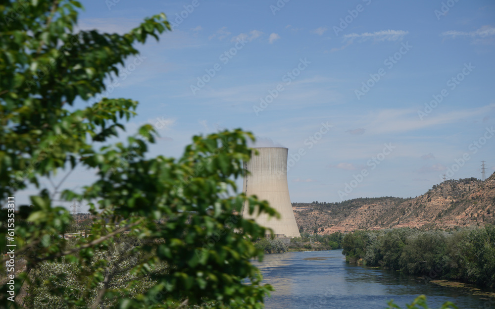 Nuclear power plant on the Rio Ebro in Spain with a cooling tower in a nice landscape