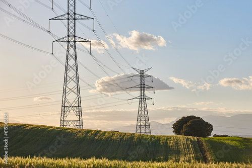 Power lines. Energy industry. Industrial electricity distribution. Renewable production photo