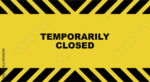 Temporarily closed sign on yellow background