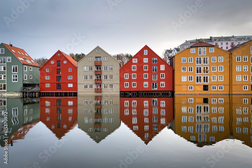 Colorful historic timber storehouses in Trondheim, Norway in winter photo