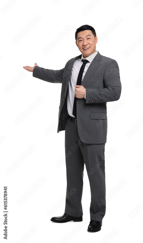 Businessman in suit posing on white background Businessman in suit posing on white background
