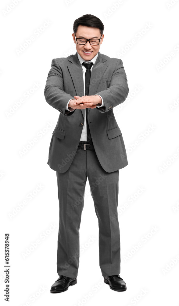 Obraz premium Businessman in suit posing on white background