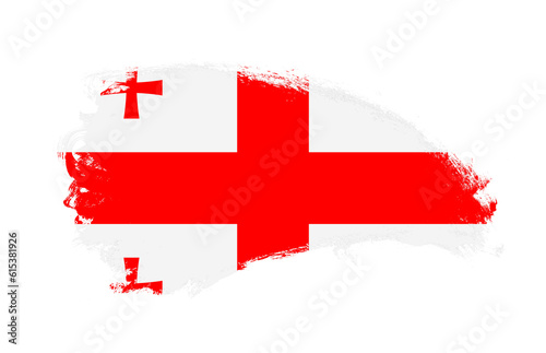 National flag of Georgia painted with stroke brush on isolated white