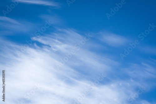 Background with blue sky and white cirrus clouds