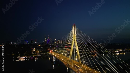 Swietokrzyski bridge on Vistula river in Warsaw at night.