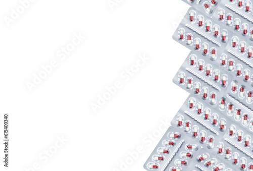 White-red capsule pill in blister pack isolated on white background. Prescription drug. Pharmaceutical industry. Pregabalin for nerve pain and anticonvulsant. Neuropathic drug. Pharmaceutical drug. photo