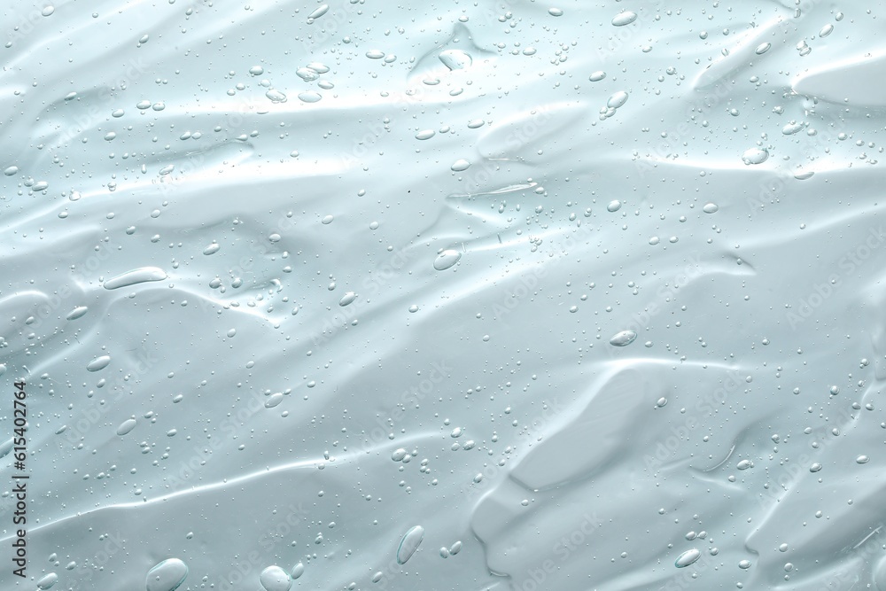 Transparent washing gel as background, closeup. Cosmetic product Transparent washing gel as background, closeup. Cosmetic product