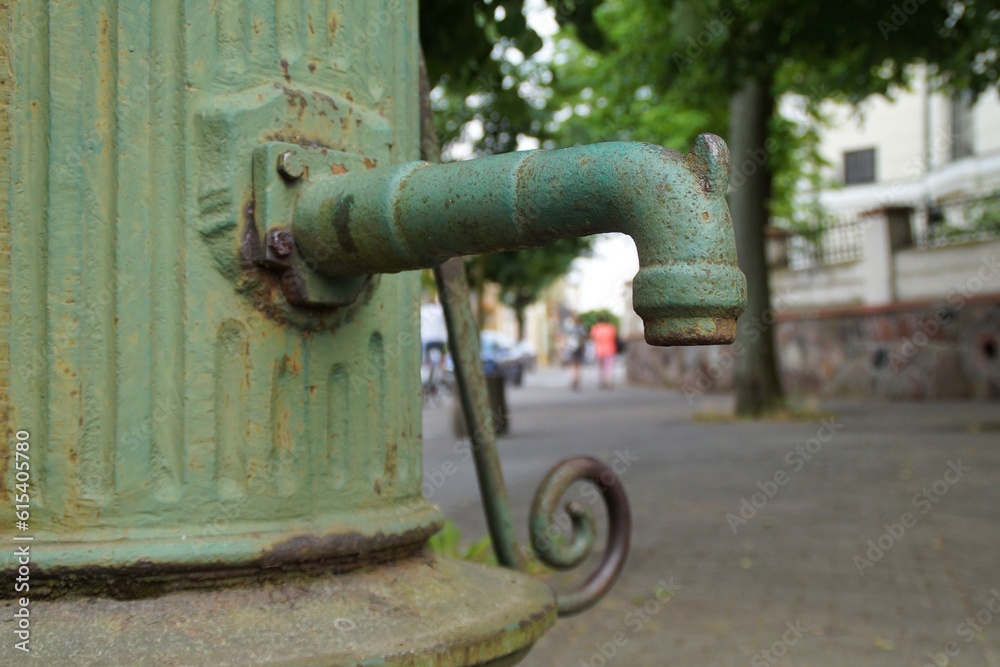 fragment of historic water pump next to the church of St. James in Skierniewice fragment of historic water pump next to the church of St. James in Skierniewice