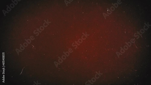Horror Movie Red Grunge Background/ 4k animation of a graphic empty vintage red background with spooky grunge texture effects and noise overlays for horror and halloween movies