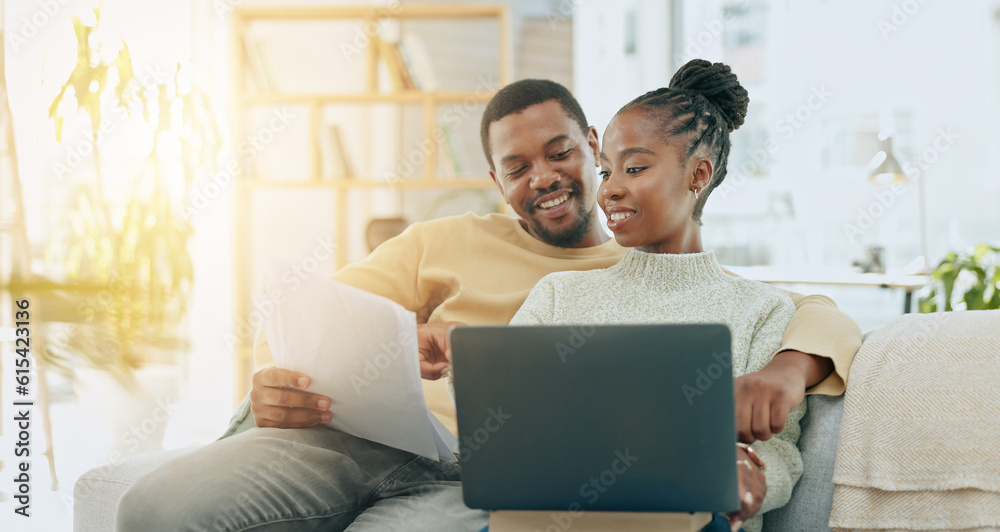 Black couple, home laptop and web banking of young people planning savings and investment info. Happiness, smile and digital investing and insurance plan of a woman and man on a living room sofa Black couple, home laptop and web banking of young people planning savings and investment info. Happiness, smile and digital investing and insurance plan of a woman and man on a living room sofa