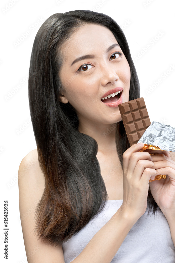 Portrait of an Asian beautiful woman with long hair holding a chocolate bar Portrait of an Asian beautiful woman with long hair holding a chocolate bar