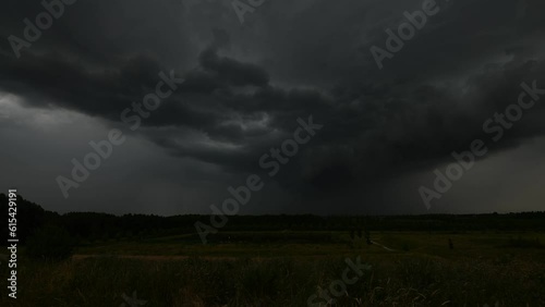 Time lapse of the approach of a dramatic looking thunderstorm over a wide open landscape.