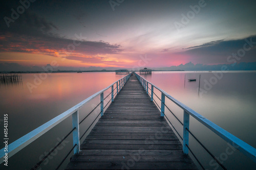 Wooden jetty on the sea at beautiful sunset  Indonesia