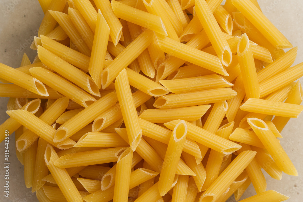 Italian pasta on table with tomatoes, pepper and different species Italian pasta on table with tomatoes, pepper and different species