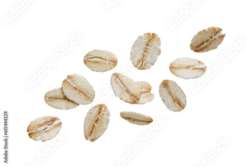 Oat flakes fly close-up on a white background.