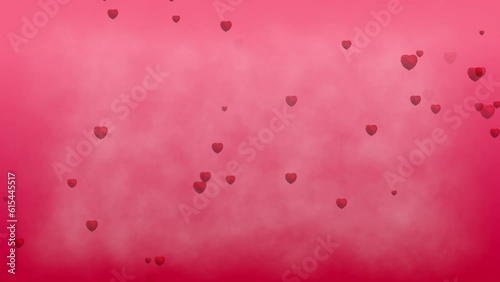 Red heart movement on a pink background and smoke. photo