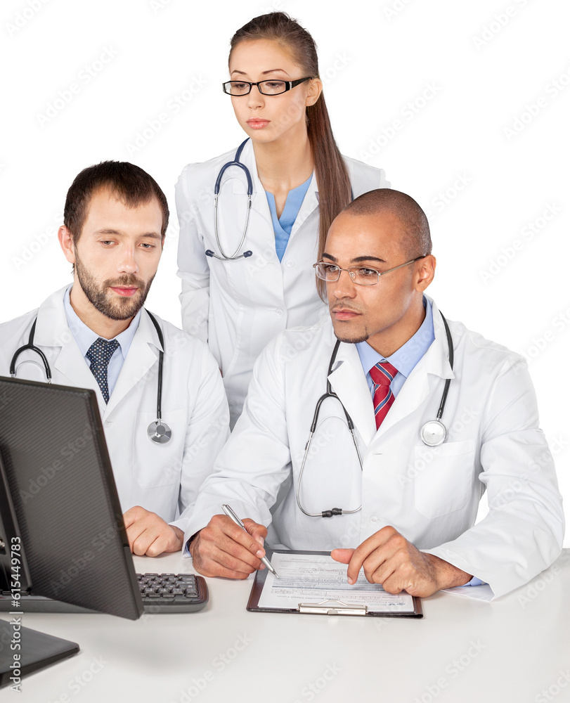 Portrait of Doctors Looking at Computer Monitor and Writing on Clipboard Portrait of Doctors Looking at Computer Monitor and Writing on Clipboard
