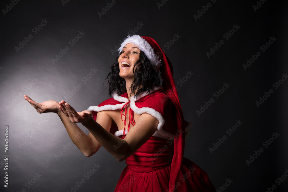 Beautiful female model wearing santa hat Beautiful female model wearing santa hat