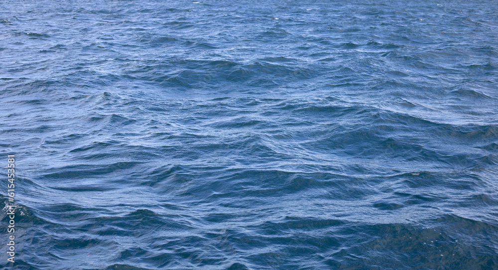 Blue sea water surface texture. Blue ocean summer Blue sea water surface texture. Blue ocean summer