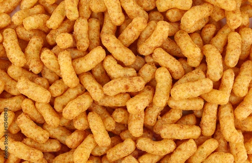 Fotografie Puffed peanuts and corn snacks