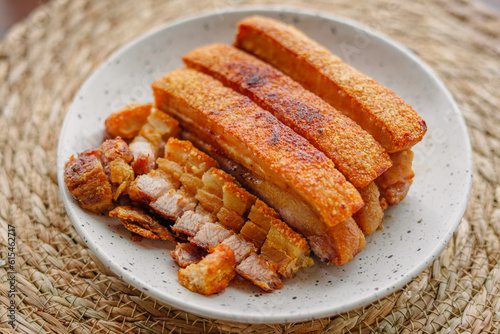 crispy fried pork belly in a plate