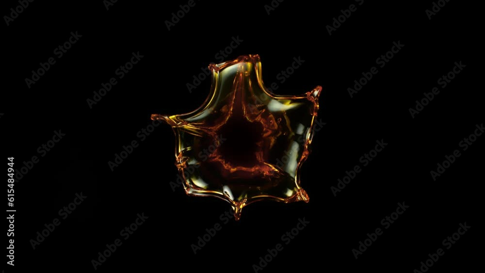 Super Slow Motion Shot of Real Oil Splash Isolated on Black Background at 1000fps. Super Slow Motion Shot of Real Oil Splash Isolated on Black Background at 1000fps.