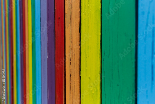 A painted fence colorful wooden background 