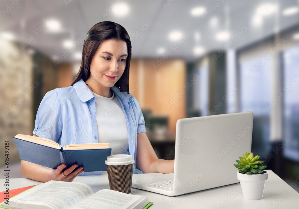 Joyful happy freelance worker works at laptop in office Joyful happy freelance worker works at laptop in office