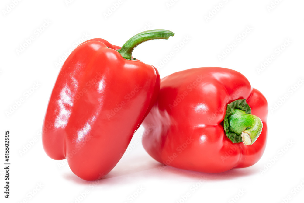 Two Fresh Red Sweet Bell Peppers Isolated on White Background Two Fresh Red Sweet Bell Peppers Isolated on White Background