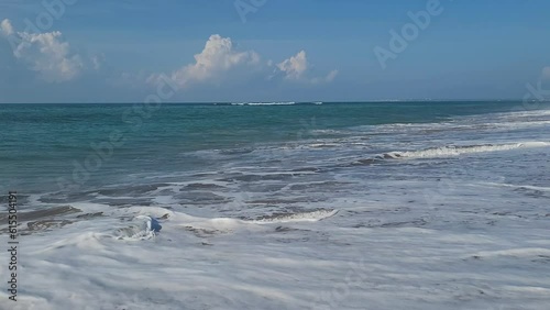Sea waves landscape with blue sky and clouds