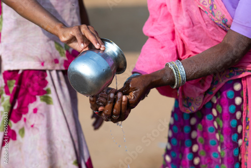 Photography Indian Rural Woman Cleaning Hand in Desi Style